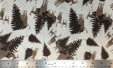 Flat swatch deer and pine trees printed fabric in earthtone (white fabric with tossed snow specks, deer and pine tree silhouettes in brown shades)
