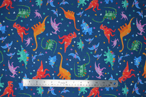 Group swatch assorted Rainbow Dino themed fabrics in various styles/colours