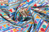 Swirled swatch Stripe fabric (busy colourful fabric with horizontal stripes containing shapes and patterns within)