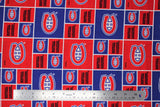 Flat swatch licensed NHL fabric in Montreal Canadiens (quilt squares pattern with red and blue backgrounds with logo, red background with team text)