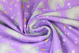 Swirled swatch unicorns flannel fabric (lavender purple fabric with small tossed grey unicorn head silhouettes with rainbow coloured horns, tossed small and medium white stars)
