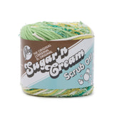 Ball of Scrub Off yarn in shade greens (white, yellow, multiple greens)