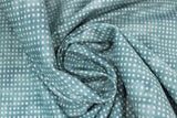 Swirled swatch homemade themed printed fabric in dots (white dots on multi-blue)