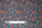Flat swatch Farmhouse Chic floral fabric (faded blue denim look fabric with small and medium tossed floral allover in pale red, cream, blue with leaves and greenery in pale tones)
