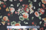 Flat swatch rose floral pattern (white/red/green/orange) on black