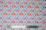 Flat swatch doctor themed printed fabric in medical equipment (cartoon medical equipment in orange/pink/blue on white)