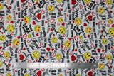Flat swatch White fabric (white fabric with busy tossed design of black "Thank you" text in various styles/fonts, tossed yellow smiley faces some with red heart eyes, and tossed hearts and heart outlines in red)