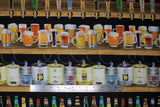 Flat swatch Beer fabric (black fabric with wood shelving and beer on tap with full steins below, bottles, etc.)