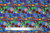 Flat swatch Marvel Hero Stickers fabric (blue fabric with tossed marvel themed badges allover: character heads, character symbols, etc.)