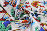 Swirled swatch Superimposed Characters fabric (white/grey subtle distressed look fabric with full colour illustrative style marvel comic book characters and marvel comics logo)