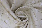 Swirled swatch Rods fabric (natural coloured fabric with tossed fishing rod silhouettes in white and dark beige)