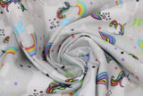 Swirled swatch comfy print flannel in unicorn (white and rainbow unicorns on grey with butterflies and rainbows)