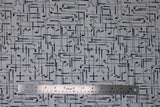 Flat swatch Clubs fabric (white fabric with collaged golf clubs allover both horizontally and vertically)