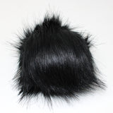 Faux fox (long hair) pom pom in black (front)