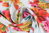 Swirled swatch tossed flower buckets fabric (white fabric with assorted floral arrangements in small buckets with "family & flowers are everything" and "love grows best in the home" text. Yellow, orange, pink, red, blue floral and green greenery)