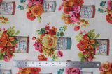 Flat swatch tossed flower buckets fabric (white fabric with assorted floral arrangements in small buckets with "family & flowers over everything" and "love grows best in the home" text. Yellow, orange, pink, red, blue floral and green greenery)