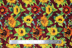 Group swatch assorted Flowers of the Sun themed fabrics in various styles/colours