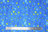 Flat swatch garden gnome themed fabric in fireflies (light/medium blue marbled fabric with cartoon glowing yellow fireflies in assorted sizes)