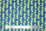 Flat swatch garden gnome themed fabric in lanterns (medium blue fabric with scalloped cartoon yellow lit lanterns on strings with red/green/yellow tops)