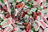 Swirled swatch Tags fabric (black fabric with tossed busy collaged christmas tags in white with red, green and blue writing and christmas graphics)