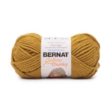 A ball of Bernat Softee Chunky yarn in shade Brass (mustard yellow orange)