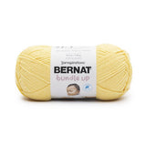 A ball of Bernat Bundle Up yarn in shade Duckling (bright yellow)