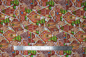 Group swatch assorted Gingerbread Factory themed fabrics in various styles/colours