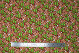Flat swatch Cookies fabric (white fabric with tossed decorated gingerbread cookies allover in green and brown trees)