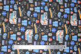 Flat swatch paramedic black fabric (black fabric with small tossed full colour paramedic themed emblems: orange stretchers, blue vests and hats, "EMT/EMS" badges and text, blood pressure cuffs, scissors, etc.)