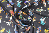Swirled swatch players black fabric (black fabric with small tossed full colour football players in various coloured uniforms/positions, etc.)