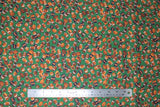 Flat swatch footballs green fabric (green fabric with small tossed brown footballs allover and orange/black number/letter signs)