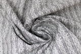 Swirled swatch touchdown fabric (grey fabric with tiny stripes of "TOUCHDOWN!" text alternating with tiny grey footballs stripes)