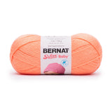 Ball of Bernat Softee Baby yarn in shade cantaloupe (pale medium orange)