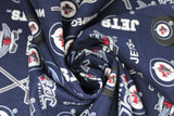 Swirled swatch NHL printed fabric in Winnipeg Jets (multi logo on navy)