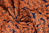 Swirled swatch Jack fabric (black fabric with small tossed orange jack-o-lantern pumpkins allover in various sizes and facial expressions)