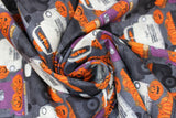 Swirled swatch Pumpkin Patch fabric (grey fabric with white, purple and black trucks allover with pumpkins in the beds and tossed jack-o-lanterns allover)