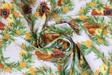 Swirled swatch Wreath fabric (white fabric with green leafy wreaths allover with yellow and orange accent leaves, red sunflower look floral and white and orange pumpkins)