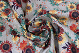 Swirled swatch Flowers fabric (grey/beige subtle vertical barnboard look fabric with busy clustered floral tossed in yellow and red sunflowers with greenery and orange leaves and berries)