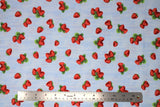 Flat swatch berry print fabric in tossed strawberries