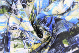 Swirled swatch blue fabric (abstract paint look fabric on white in black, yellow, green, blue with various textures, shapes and circles)