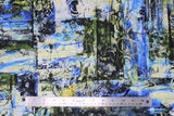 Flat swatch blue fabric (abstract paint look fabric on white in black, yellow, green, blue with various textures, shapes and circles)