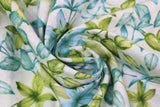 Swirled swatch Green fabric (white fabric with busy tossed pointy floral heads and leaves in blue and green)