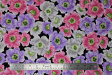 Flat swatch Pink/Purple/Black fabric (black fabric with tossed large floral heads in white, pink, and purple with green and yellow centers)