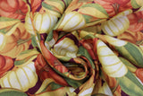 Swirled swatch halloween printed fabric in Tossed Pumpkins (orange and white pumpkins and green gourd collage)