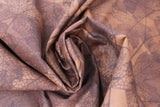 Swirled swatch halloween printed fabric in Leaf Silhouettes on Brown