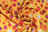 Swirled swatch onion fabric (mustard yellow fabric with cartoon onions with happy faces in various sizes and onion styles: red, white, purple, etc.)