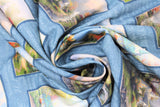 Swirled swatch church squares fabric (pale blue fabric with pale white/light blue deconstructed lord's prayer text allover and square/rectangle photo illustrations of churches with blue frames)