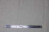 Flat swatch linen fabric in shade linen (pale beige grey/neutral)