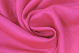 Swirled swatch hot pink linen fabric