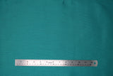 Flat swatch emerald green linen fabric